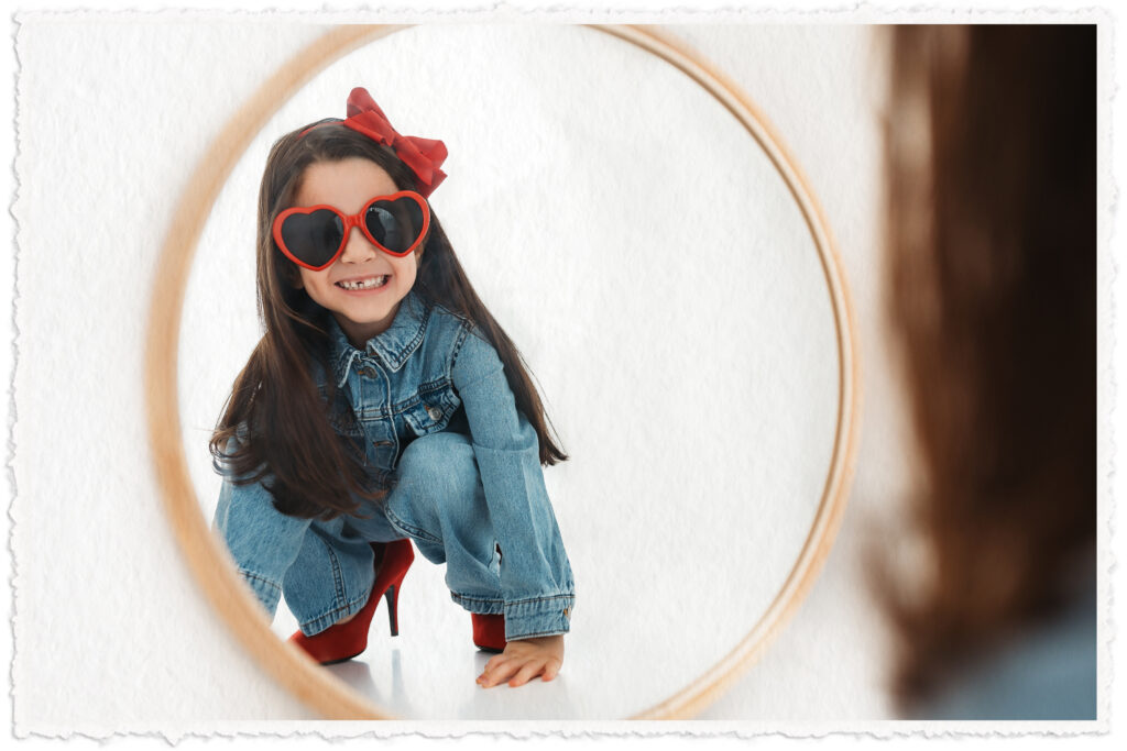 Packagesandprice-smallgirl-gallery-sheislookingherselfinamirror-shehasahugeradsunglasseson